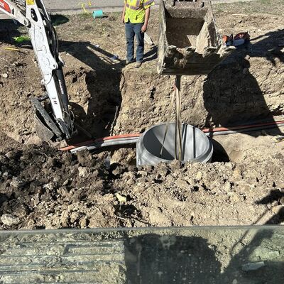 Installing new sewer manholes