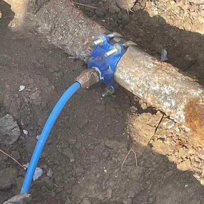 Tapping city water main for new service line