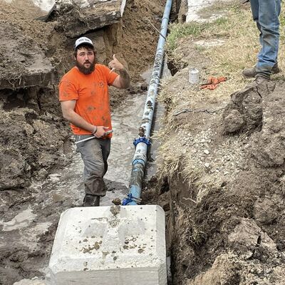 Install city water line with thrust block